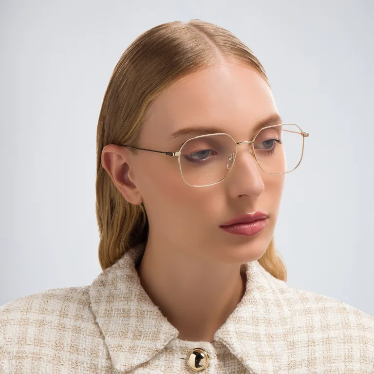 Shop GUCCI Rectangle Eyeglasses in Gold online.