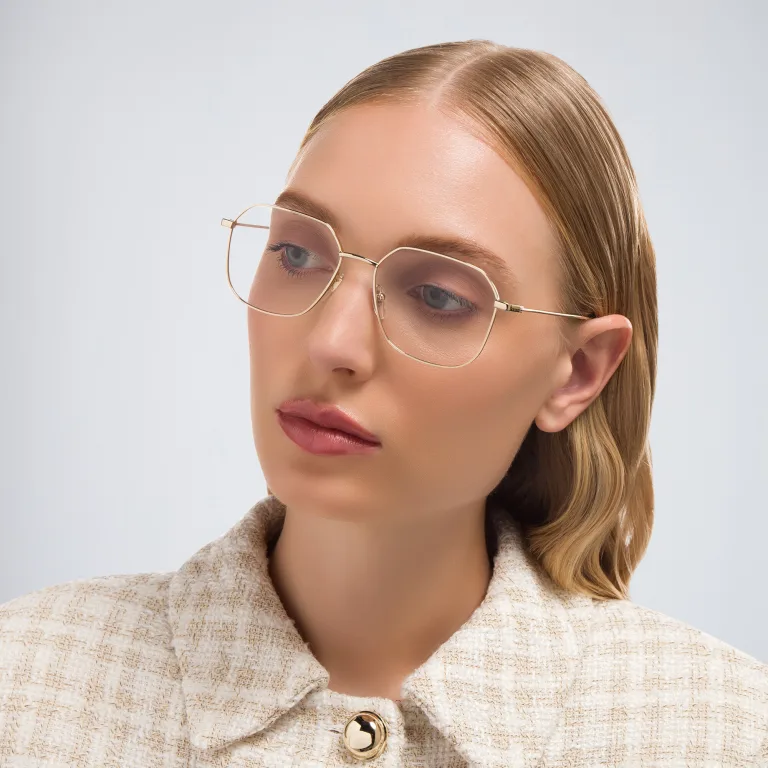 Shop GUCCI Rectangle Eyeglasses in Gold online.