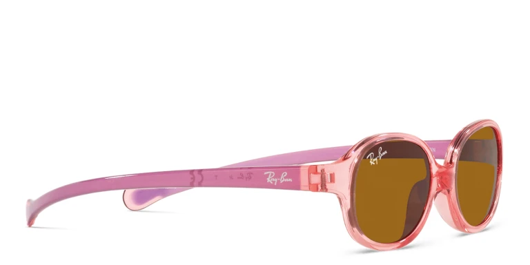 Shop Ray-Ban Junior Kids Round Sunglasses in Pink online.
