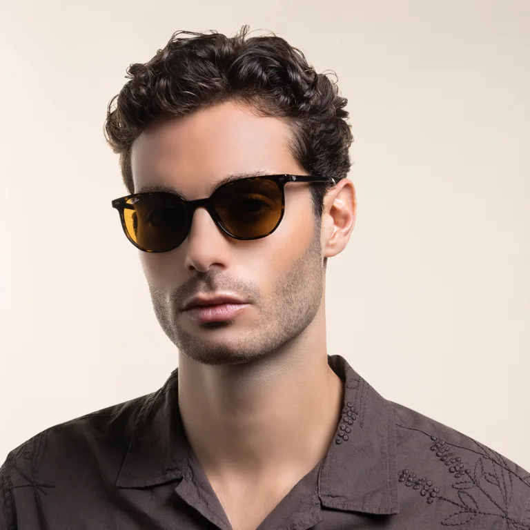 Shop Ray-Ban Elliot Unisex Square Sunglasses in Havana online.