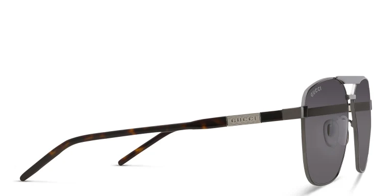 Shop GUCCI Aviator Sunglasses in Grey online.