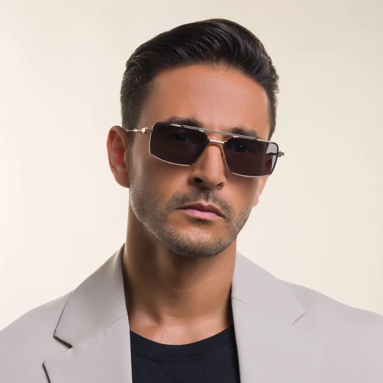 Shop VALENTINO Unisex Aviator Sunglasses in Gold online.