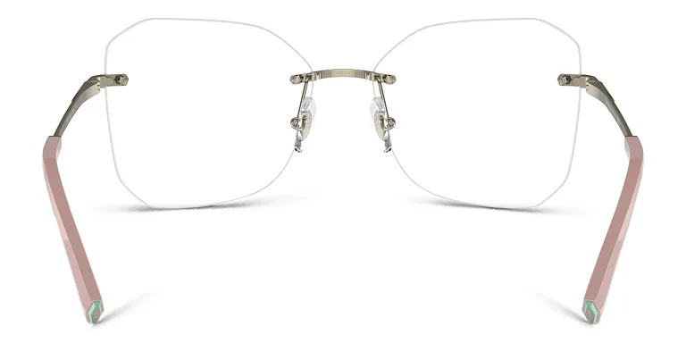 Shop TIFFANY Wide Irregular Eyeglasses in Gold online.