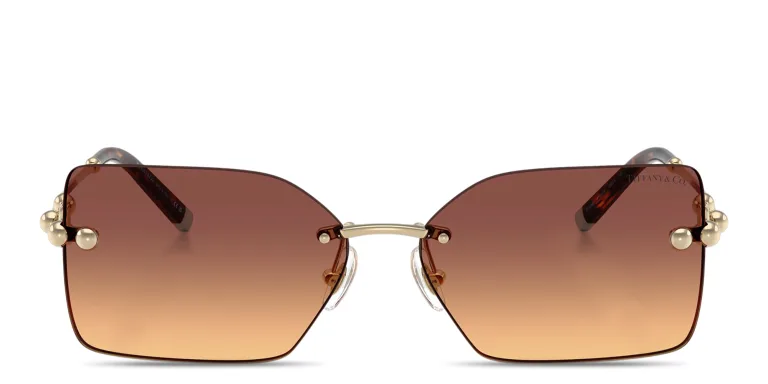 Shop TIFFANY Tiffany HardWear Rimless Rectangle Sunglasses in Gold online.