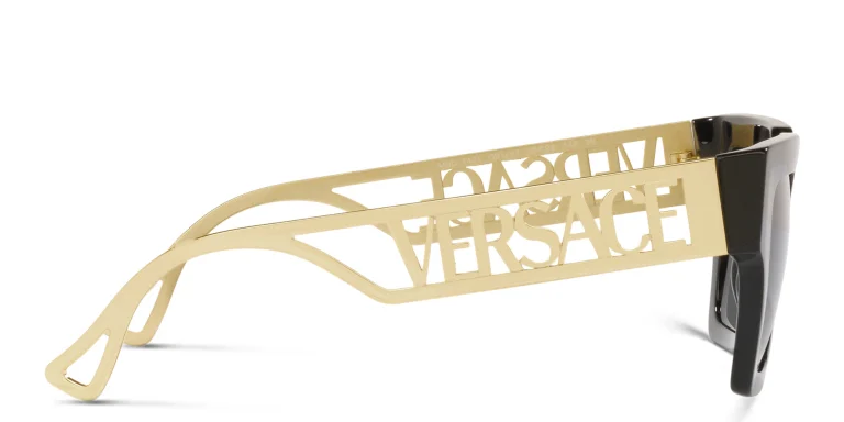 Shop VERSACE 90s Vintage Logo Sunglasses in Black online.