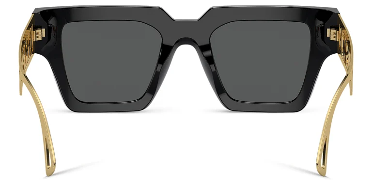 Shop VERSACE 90s Vintage Logo Sunglasses in Black online.