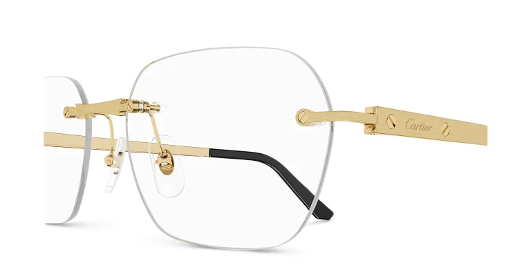 Shop Cartier Santos de Cartier Wide Rectangle Eyeglasses in Gold online.