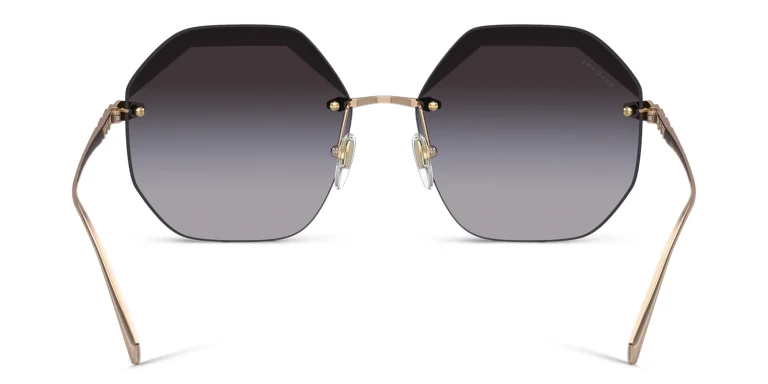 Shop BVLGARI Oversized Rimless Irregular Sunglasses in Gold online.