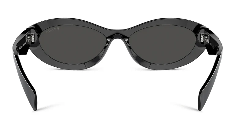 Shop PRADA Irregular Sunglasses in Black online.