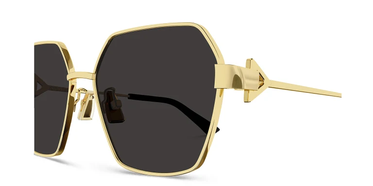 Shop BOTTEGA VENETA Irregular Sunglasses in Gold online.