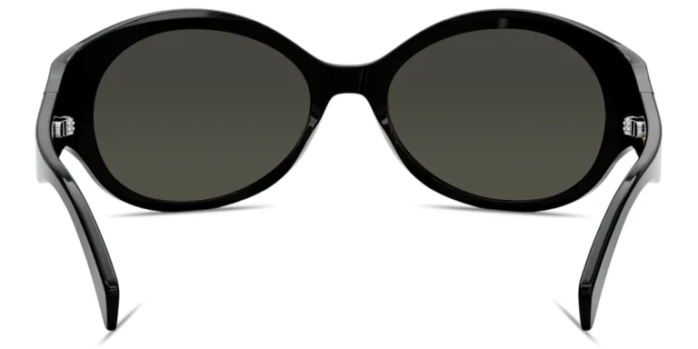 Shop CELINE Triomphe Oval Sunglasses in Black online.