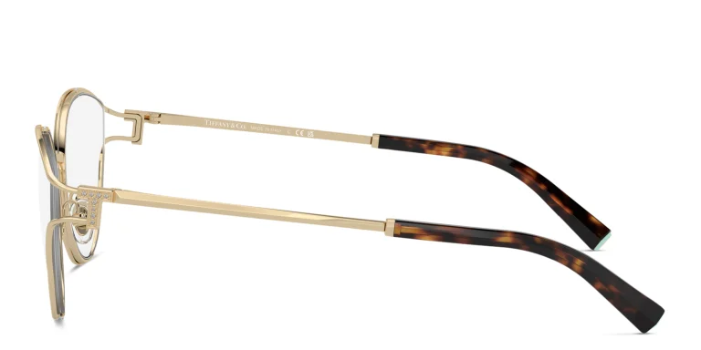 Shop TIFFANY Oval Eyeglasses in Gold online.