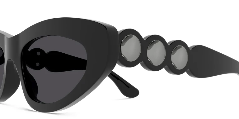 Shop ALAIA Scalloped Cat-Eye Sunglasses in Black online.