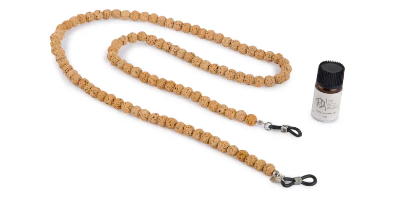 Shop The RICCI DISTRICT Lava Stone Unisex Glasses Chain in Yellow online.