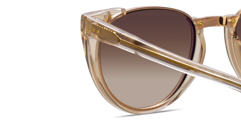 Shop LINDA FARROW Iris Oval Sunglasses in Brown online.
