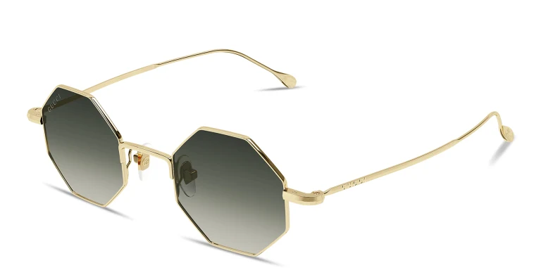 Shop GUCCI Engraved Logo Unisex Irregular Sunglasses in Gold online.