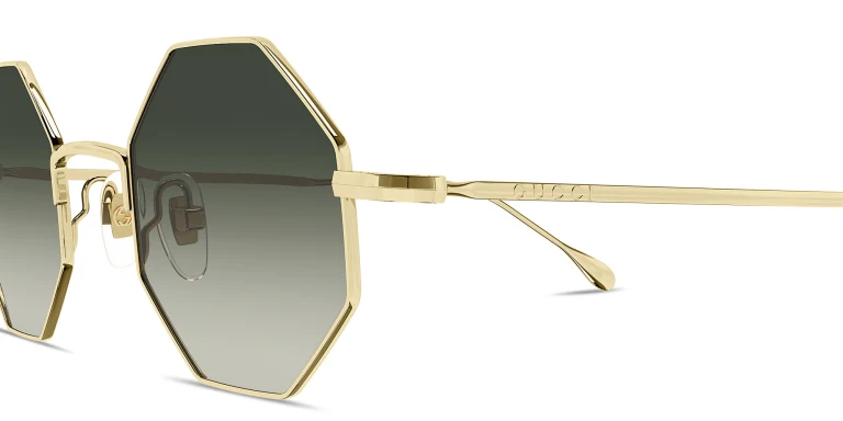 Shop GUCCI Engraved Logo Unisex Irregular Sunglasses in Gold online.