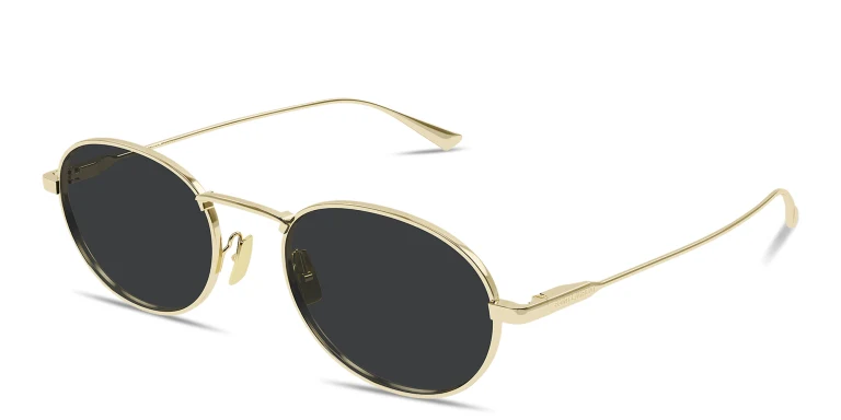 Shop SAINT LAURENT Engraved Logo Round Sunglasses in Gold online.