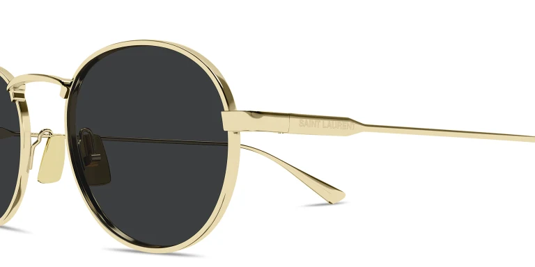 Shop SAINT LAURENT Engraved Logo Round Sunglasses in Gold online.