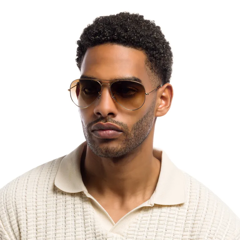Shop Ray-Ban Pilot Gradient Sunglasses in Gold online.