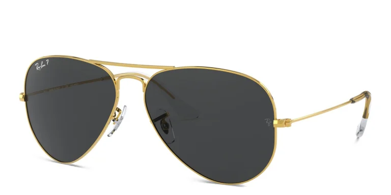 Shop Ray-Ban Unisex Pilot Polarized Sunglasses in Metal in Gold online.