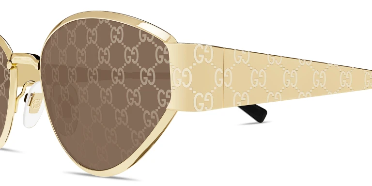 Shop GUCCI GG Motif Irregular Sunglasses in Gold online.