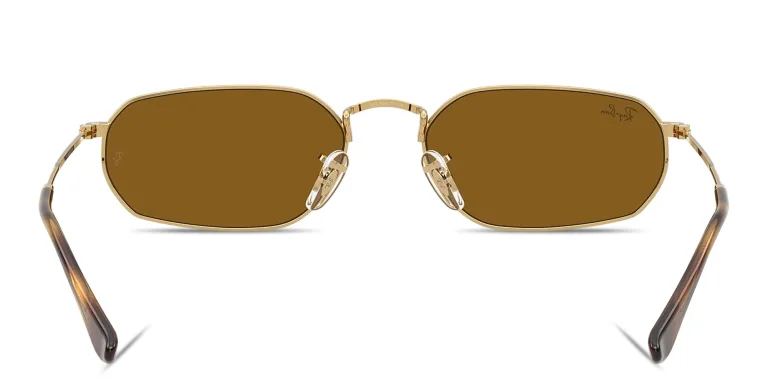 Shop Ray-Ban Logo Signature Unisex Irregular Sunglasses in Gold online.