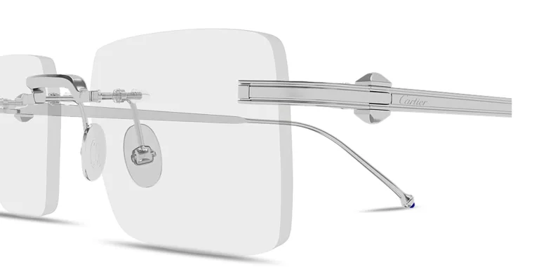 Shop Cartier Pasha Rimless Rectangle Eyeglasses in Silver online.