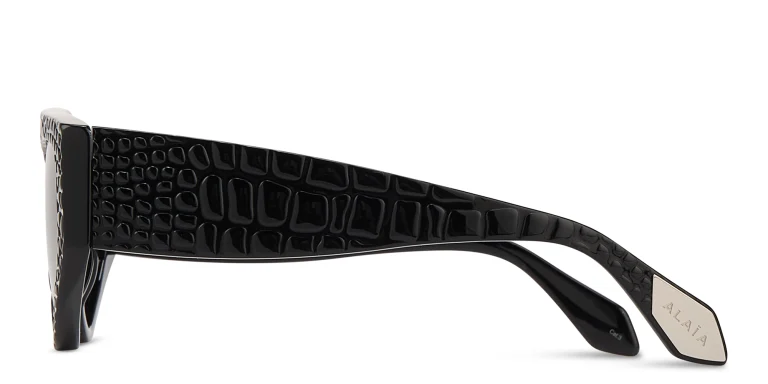 Shop ALAIA Croco Irregular Sunglasses in Black online.