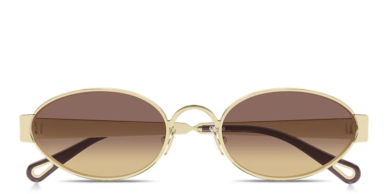 Shop Chloe Holly Oval Sunglasses in Gold online.