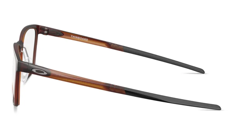 Shop Oakley Thinboard Unisex Wide Rectangle Eyeglasses in Orange online.