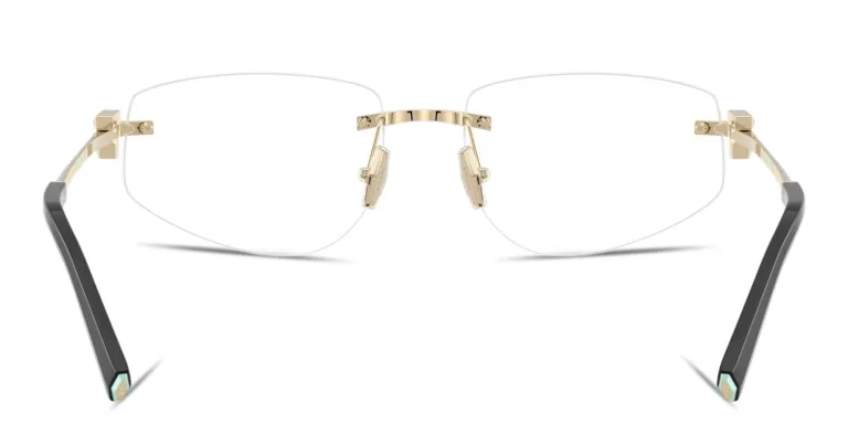 Shop TIFFANY Tiffany T Rimless Wide Irregular Eyeglasses in Gold online.