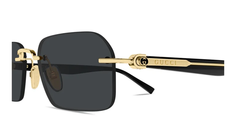 Shop GUCCI Gucci Emblem Rimless Rectangle Sunglasses in Gold online.