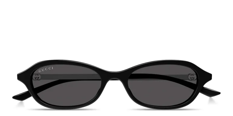 Shop GUCCI GG Oval Sunglasses in Black online.