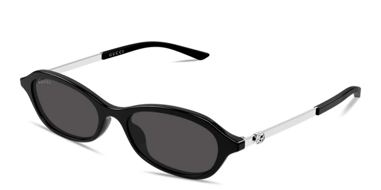 Shop GUCCI GG Oval Sunglasses in Black online.