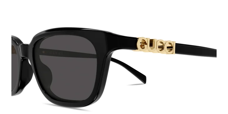 Shop GUCCI Logo Lettering Rectangle Sunglasses in Black online.