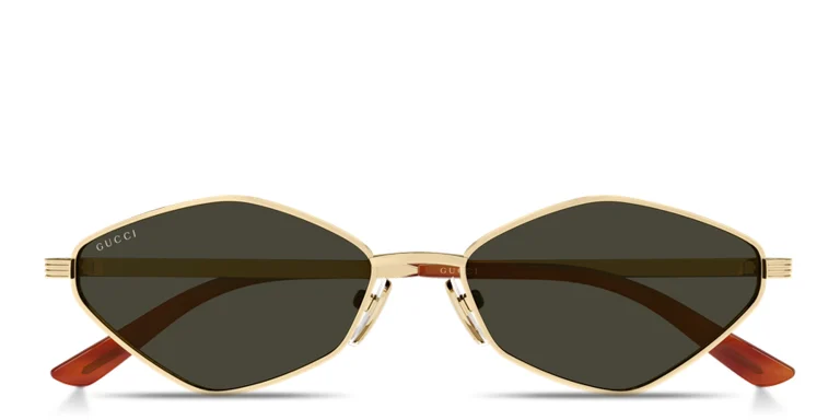 Shop GUCCI Engraved Logo Irregular Sunglasses in Gold online.