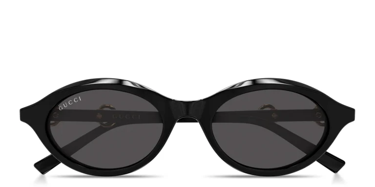 Shop GUCCI Horsebit Oval Sunglasses in Black online.