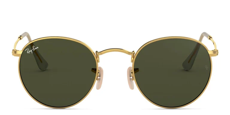 Shop Ray-Ban Round Metal Sunglasses in Gold online.
